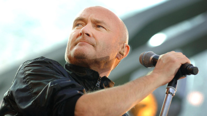 GA2R12 Phil Collins of Genesis performs at Twickenham Stadium, London.