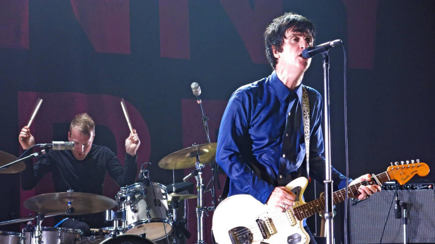 DRH8AE DRH8AE Johnny Marr of Smiths Manchester Academy live on stage playing fender guitar England UK 2013 12-10-2013