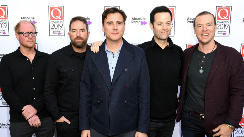 2DGY59J Members of the band Jimmy Eat World, Rick Burch, Zach Lind, Jim Adkins and Tom Linton (left to right) during the Q Awards 2019 at the Roundhouse, London.