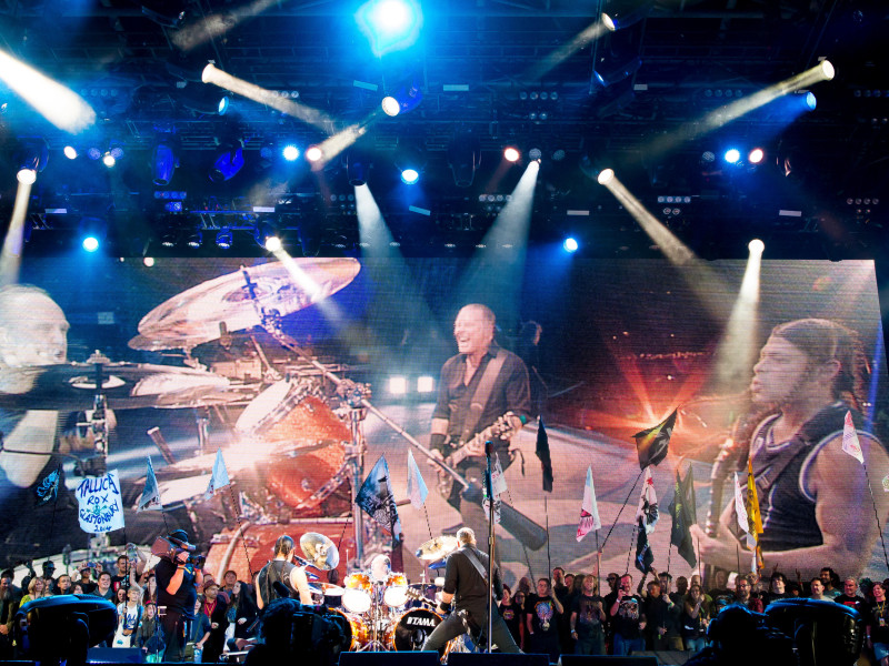 TXNR8P Heavy metal band Metallica headline Glastonbury Festival's Pyramid stage. Glastonbury Festival of Contemporary Performing Arts is the largest music festival in UK, attracting over 135,000 people each to Pilton, Somerset.