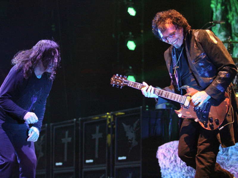 RM8TK1 Singer Ozzy Osbourne and guitarist Tony Iommi are shown performing on stage during a "live" concert appearance with Black Sabbath.