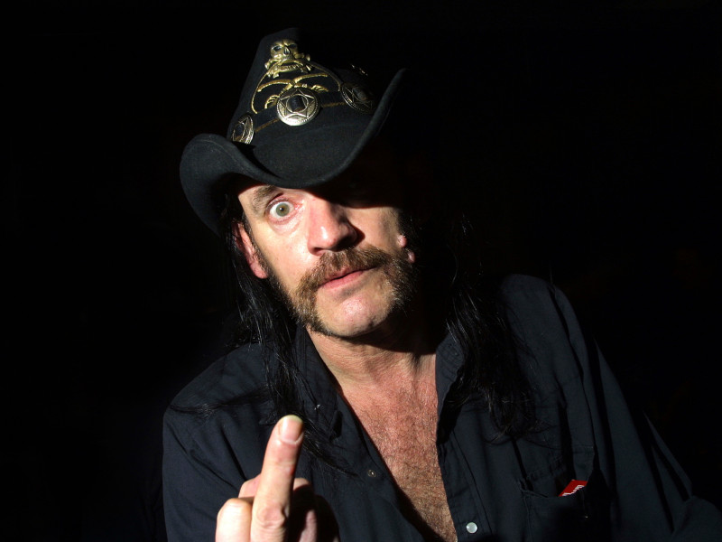AMP7A8 Lemmy from Motorhead in club Milk in Belfast giving the one finger salute