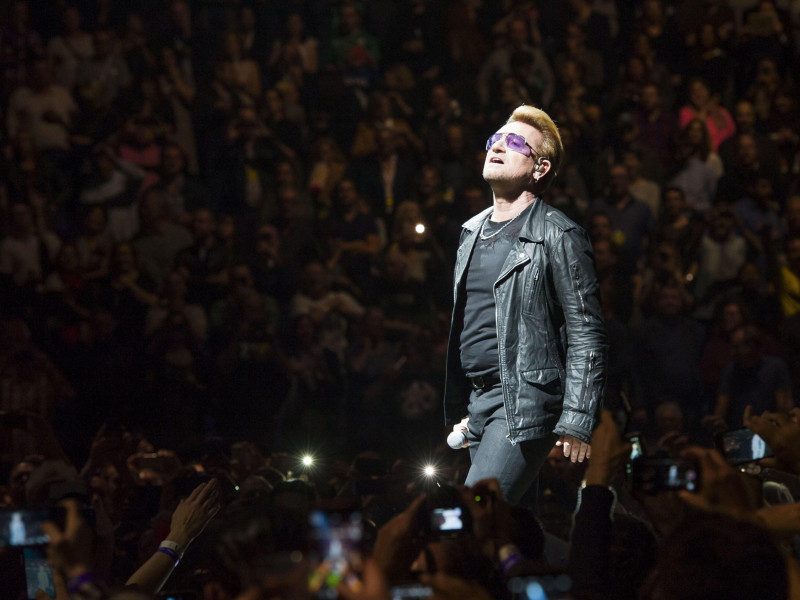 G8DG0H Bono from U2 performing during their Innocence + Experience tour at the O2 arena in Greenwich, London.