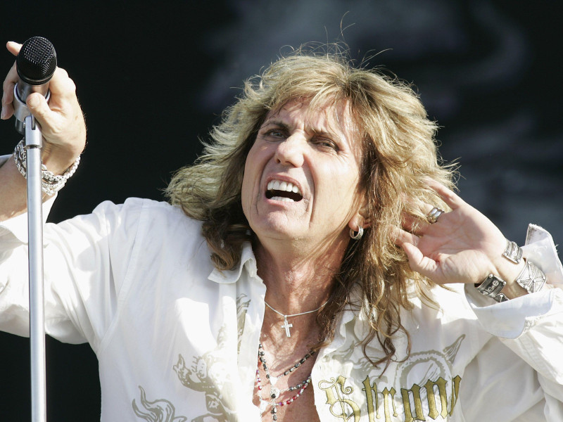 2HBKNJ8 David Coverdale of Whitesnake performs on stage at Download Festival 2009 at Donnington Park, in Derby, England