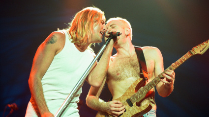 ET4C1A Joe Elliott of Def Leppard performing live at the NEC Birmingham. 16th November 1996.