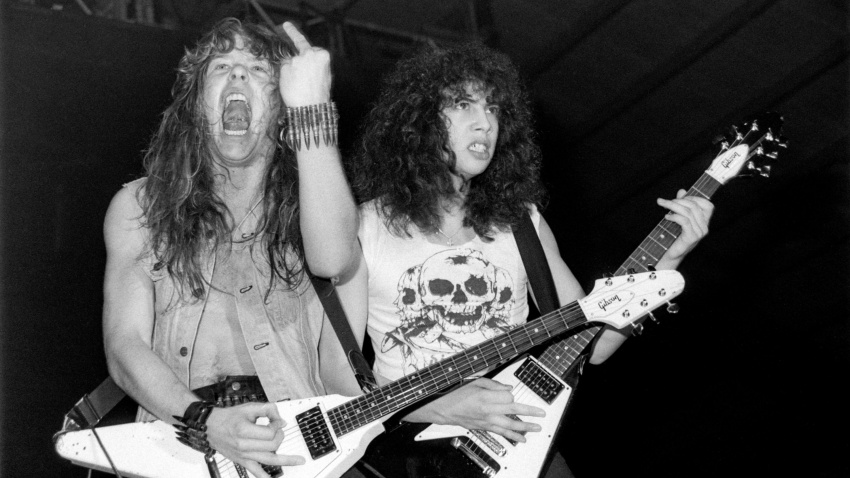 2D89NC8 ZWOLLE, THE NETHERLANDS - FEBR 11, 1984: Metallica performing live on stage during their first concert in the Netherlands in the IJsselhal in Zwolle.