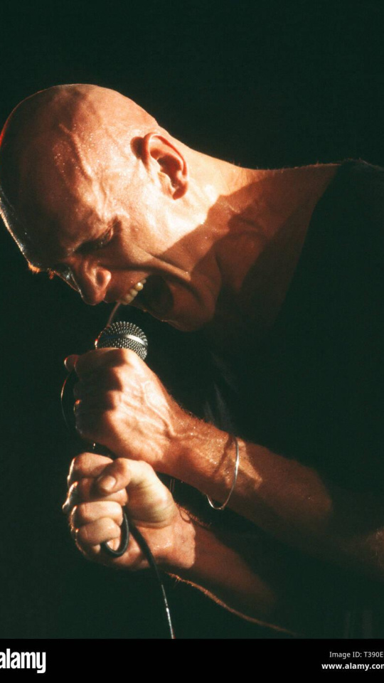 T390ER T390ER Celebrity.  Musician singer. Peter Garrett of Midnight Oil rock band on stage.