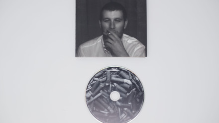 2HXDTDT Arctic Monkeys - Whatever people say I am, that?s what I?m not album with CD on white background