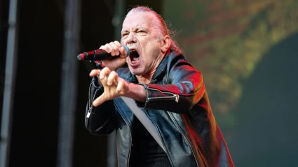 3BMXM76 Bruce Dickinson seen live on stage with band Iron Maiden. Iron Maiden Play London Stadium as part of the Run For Your Lives World Tour. The tour marks 50 years since Steve Harris formed the band. Iron Maiden are calling their tour date at London Stadium their homecoming show with band members coming from the surrounding area and also the band have a long history with football team West Ham. Iron Maiden are Bruce Dickinson on lean vocals, Steve Harris on Bass Guitar, Dave Murray on guitar, Adrian Smith on guitar Janick Gers on guitar and drummer Simon Dawson who has stepped in for this tour aft