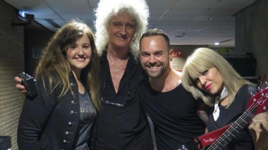 Danny Gómez con Brian May