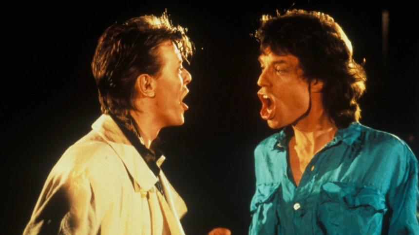 DAVID BOWIE AND MICK JAGGER PERFORMING 'DANCING IN THE STREET'S'. 1985. PICTURE.