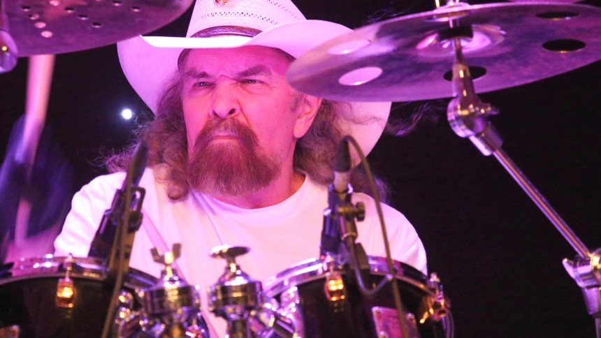 RMW7YM Drummer Artimus Pyle, formerly of the Lynyrd Skynyrd Band, is shown performing on stage during a "live" concert appearance with the Artimus Pyle Band.